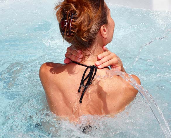 woman standing in a hot tub